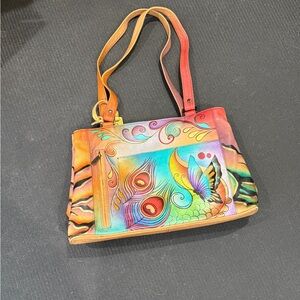 Anuschka Red and Orange Shoulder Bag with Artistic Flair